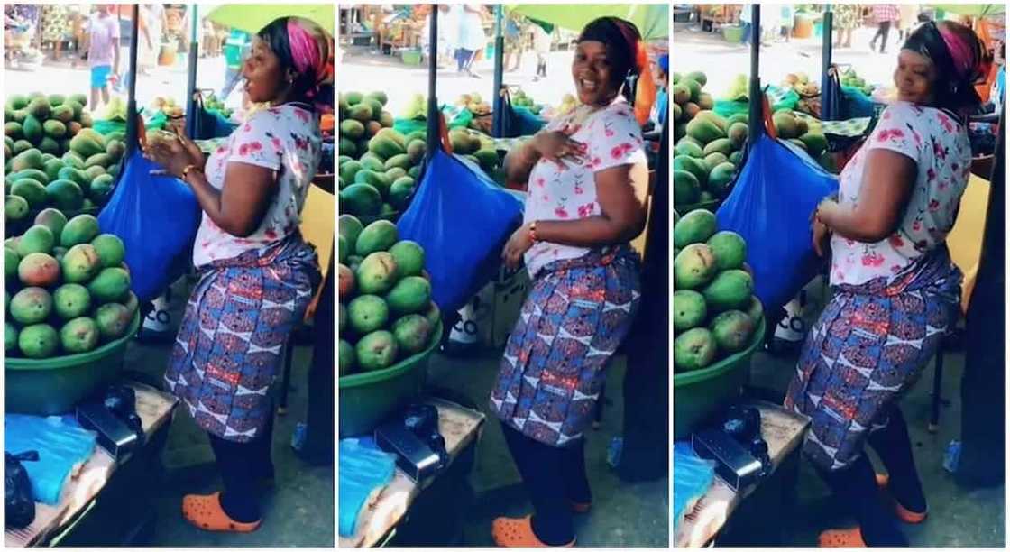 Photos of a mango seller dancing in her shop and shaking her waist