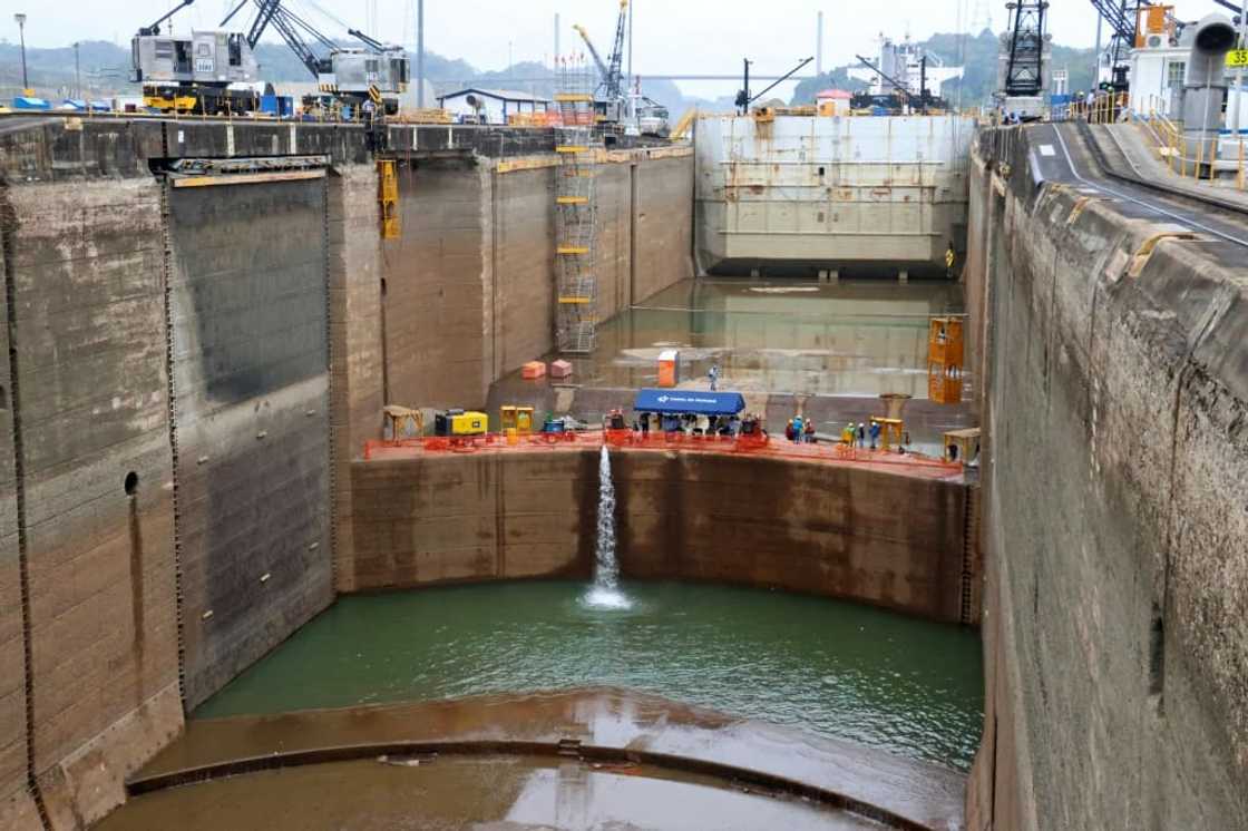 Maintenance work intended to extend the life of the Panama Canal by a century is carried out in a drained lock near the Pacific Ocean, on May 12, 2023 Maintenance work intended to extend the life of the Panama Canal by a century is carried out in a drained lock near the Pacific Ocean, on May 12, 2023
