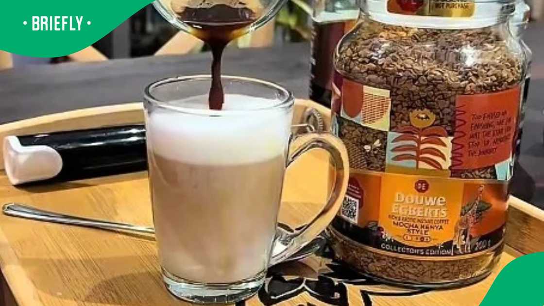 Woman shows eveything she made with Douwe Egberts jars