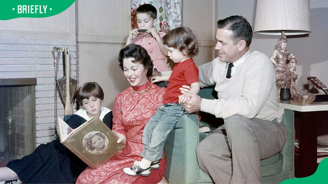 Shirley Temple and Charles A. Black with their three children. Shirley Temple and Charles A. Black with their three children.