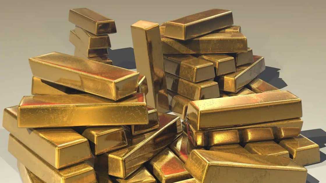Bars of gold heaped on each other Bars of gold heaped on each other