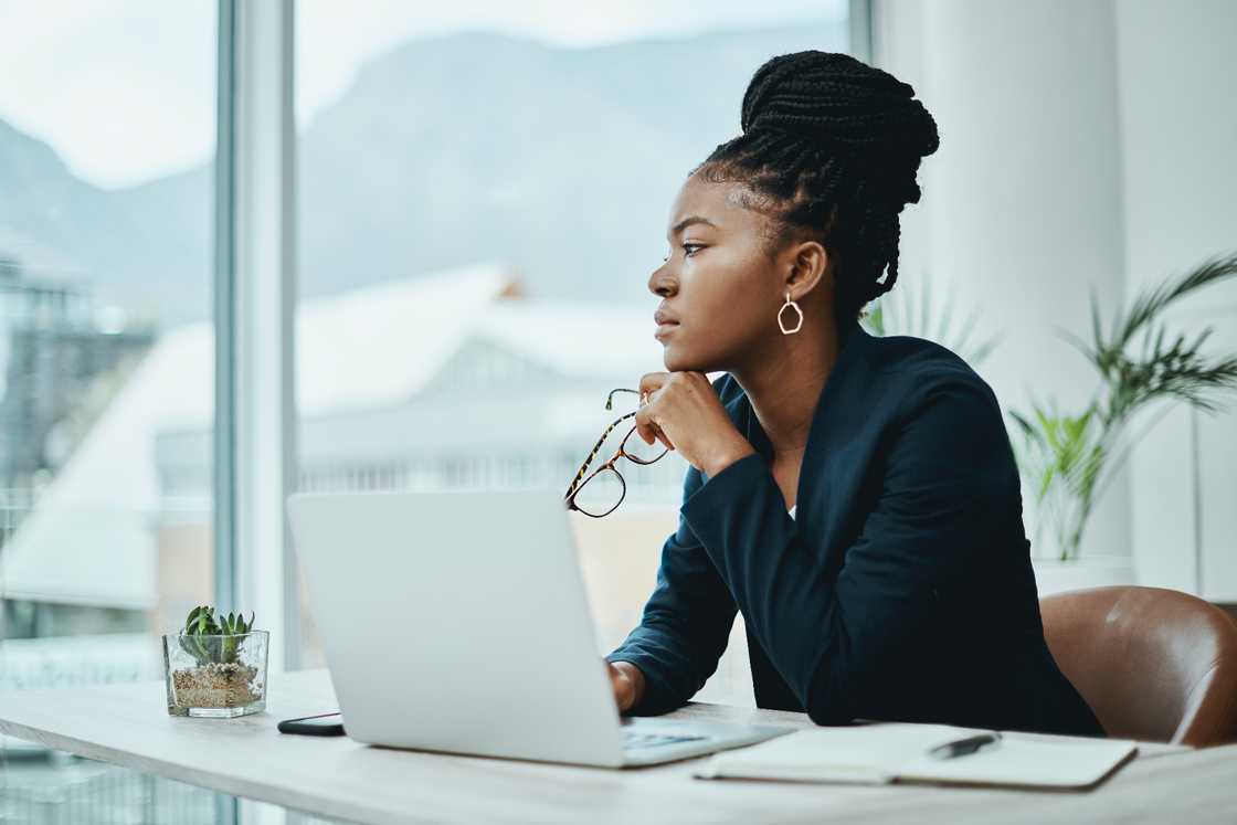 Shot of a young businesswoman using a laptop