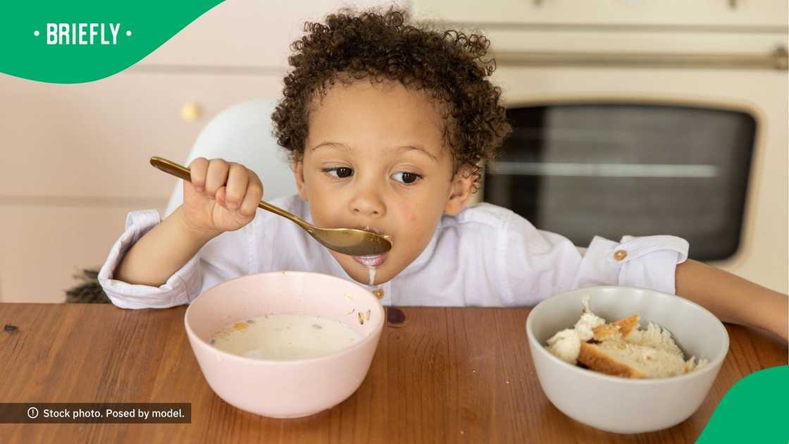 Woman shows lunch for 10-month old