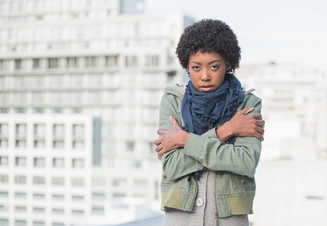 A shivering woman A shivering woman