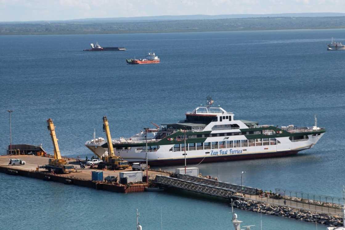 TotalEnergies used a ferry to evacuate people during the March 2021 attack by armed insurgents at its gas facility in Mozambique, but survivors and relatives of victims say the French company did not do enough to protect contractors