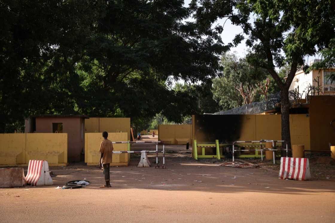 Protest aftermath: The damaged entrance to the French embassy in Ouagadougou Protest aftermath: The damaged entrance to the French embassy in Ouagadougou