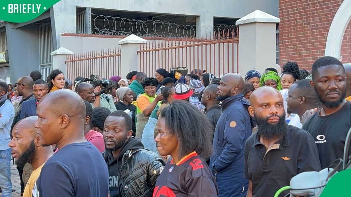 A large group of foreign nationals slept outside the Diakonia Centre A large group of foreign nationals slept outside the Diakonia Centre