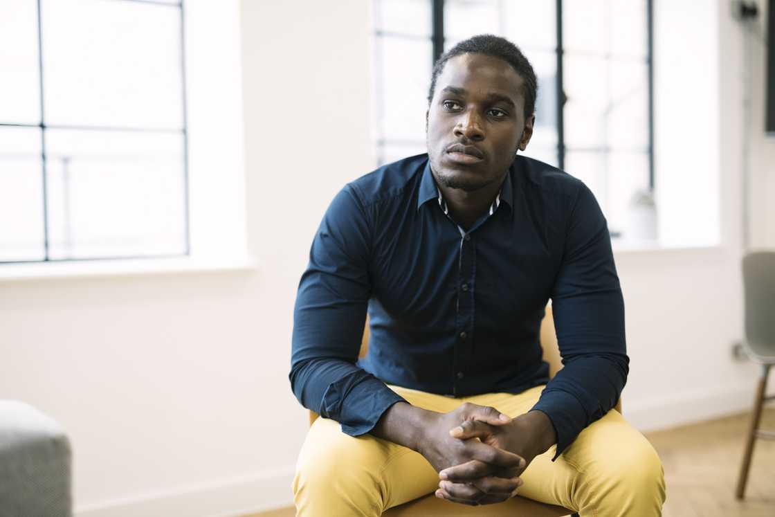 A relaxed man reflecting on his life