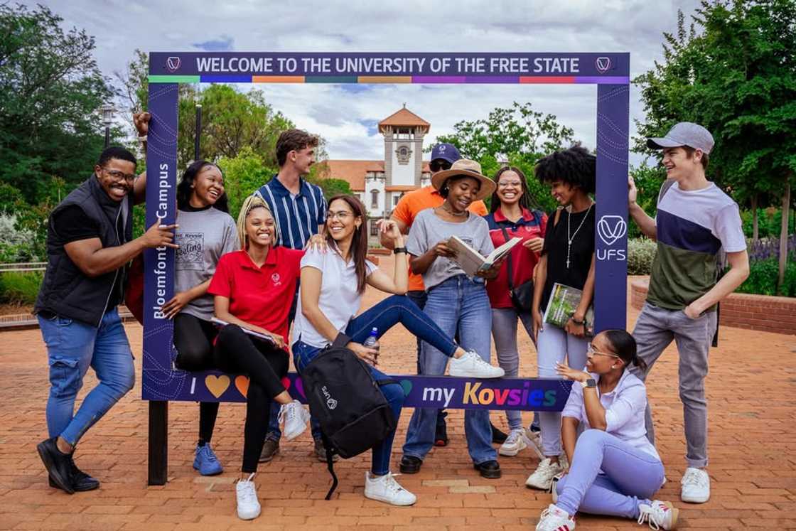 Young university students posing together at the University of the Free State (UFS) in South Africa. Young university students posing together at the University of the Free State (UFS) in South Africa.