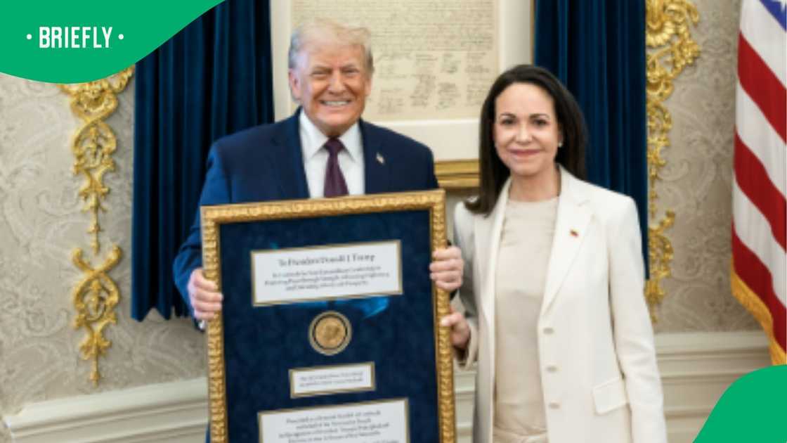 President Trump smiles with María Corina Machado after she gifted him the Nobel Peace Prize.