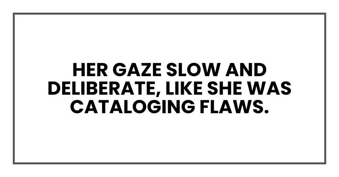 her gaze slow and deliberate, like she was cataloging flaws.