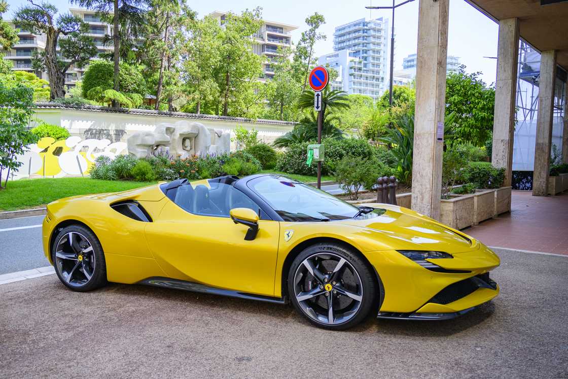 Ferrari SF90 Spider (Type F173) hybrid sports car parked on the street in front of Hotel Hermitage in Monte Carlo
