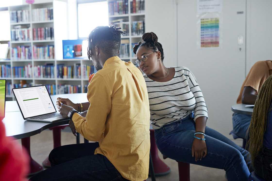 Students studying in a library