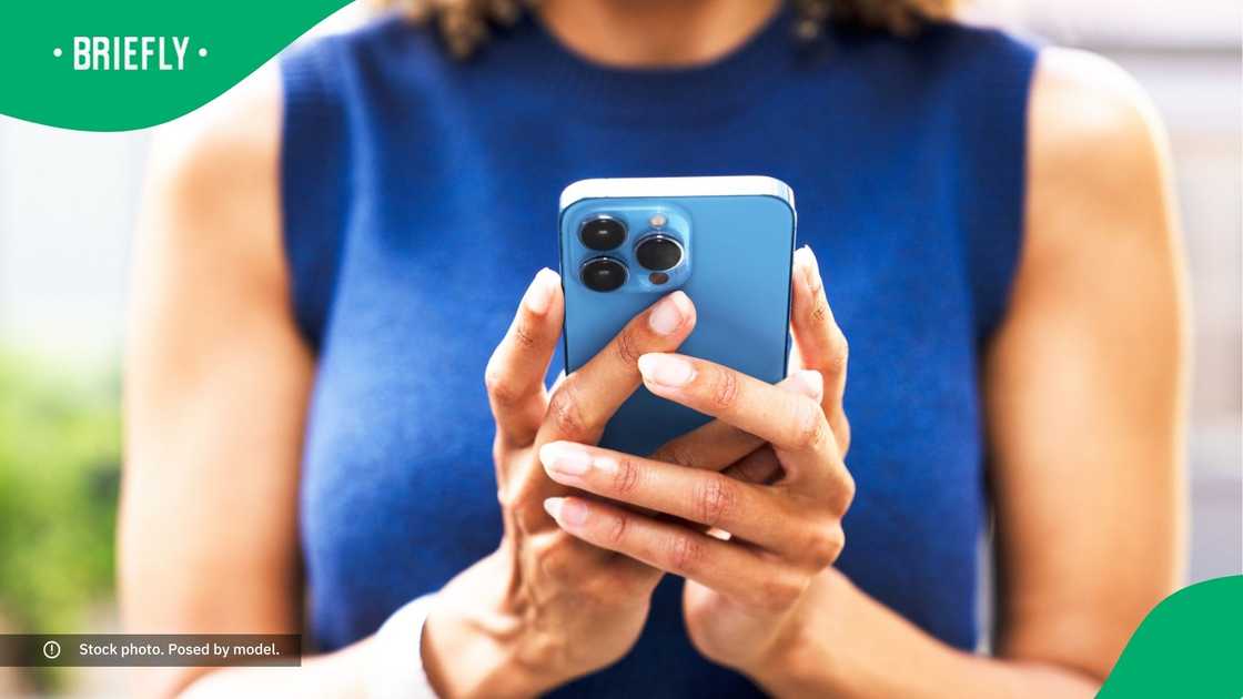 Close-up of woman using smart phone. Close-up of woman using smart phone.