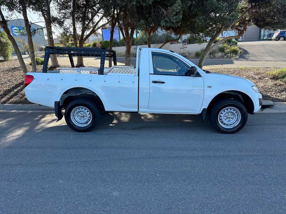 A white Mitsubishi Triton A white Mitsubishi Triton