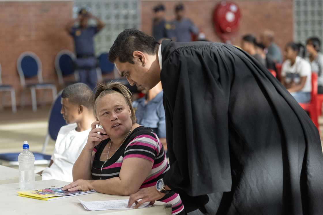 Kelly Smith and her lawyer Rinesh Sivnarain Kelly Smith and her lawyer Rinesh Sivnarain