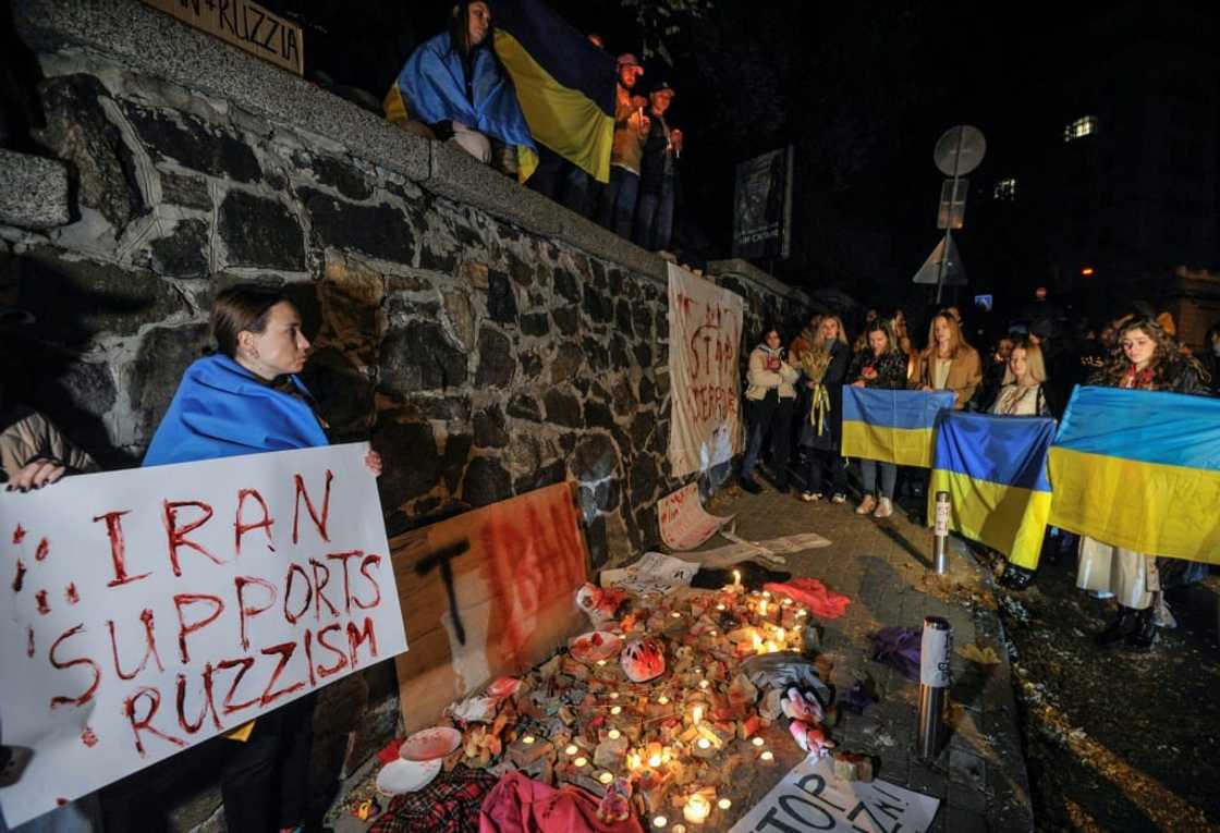 People demonstrate outside the Iranian embassy in Ukraine after Kyiv was hit by swarms of kamikaze drones sold by Iran to Russia