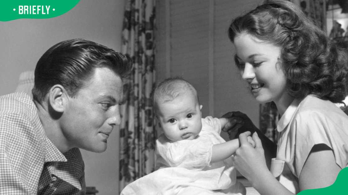 Shirley Temple and John Agar pose with their daughter, Linda Susan. Shirley Temple and John Agar pose with their daughter, Linda Susan.