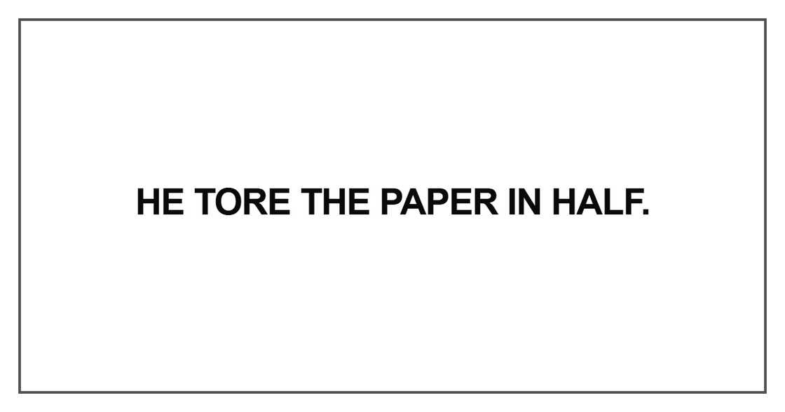 He tore the paper in half