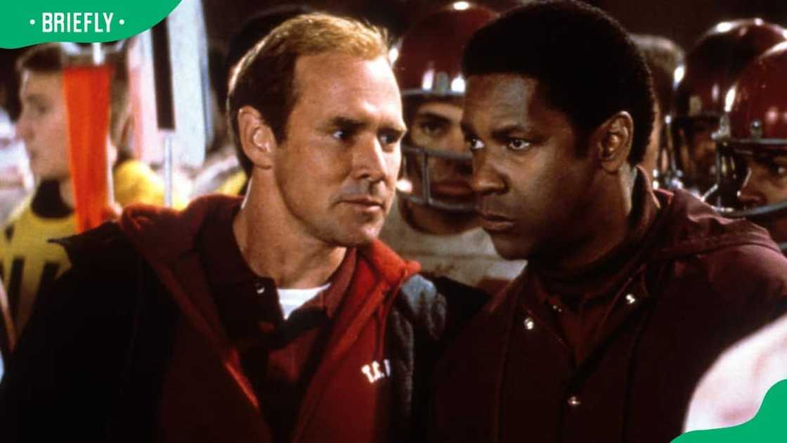 Will Patton talking to Denzel Washington in a scene from the 2000 film Remember The Titans Will Patton talking to Denzel Washington in a scene from the 2000 film Remember The Titans