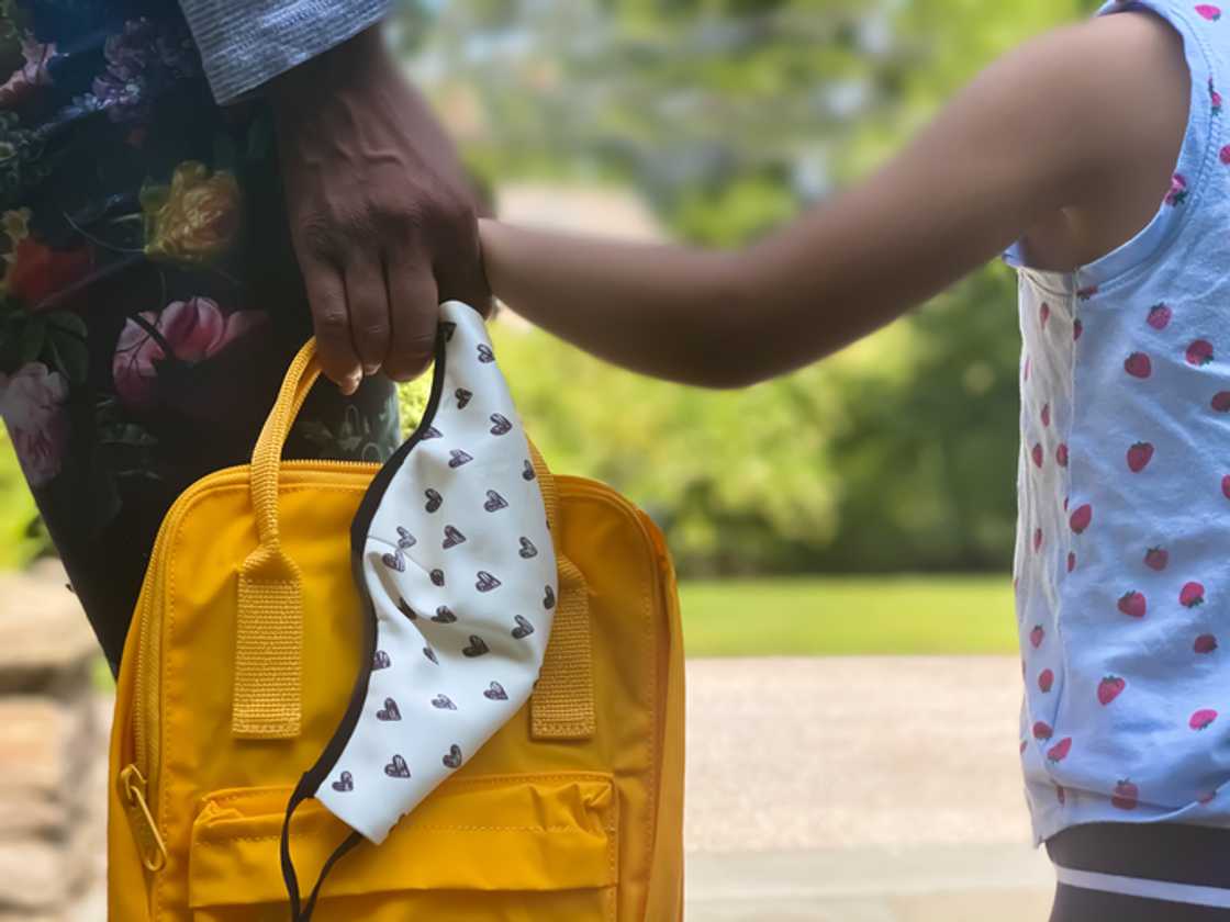 A toddler put up a fight as she refused to enter the classroom on the first day of school. A toddler put up a fight as she refused to enter the classroom on the first day of school.