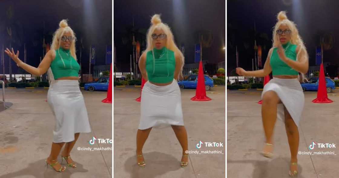 TikTok user @cindy_makhathini_ served confidence and sass in heels and a white skirt TikTok user @cindy_makhathini_ served confidence and sass in heels and a white skirt