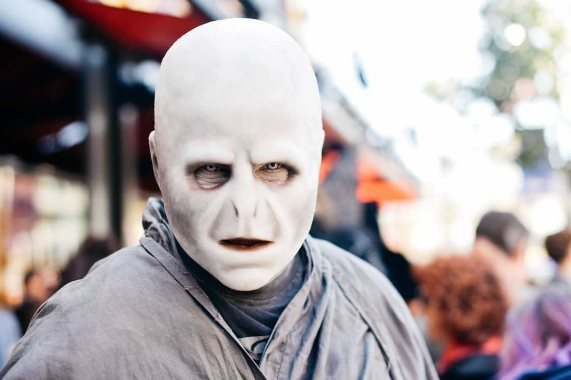 A cosplayer dressed as Lord Voldemort from Harry Potter A cosplayer dressed as Lord Voldemort from Harry Potter