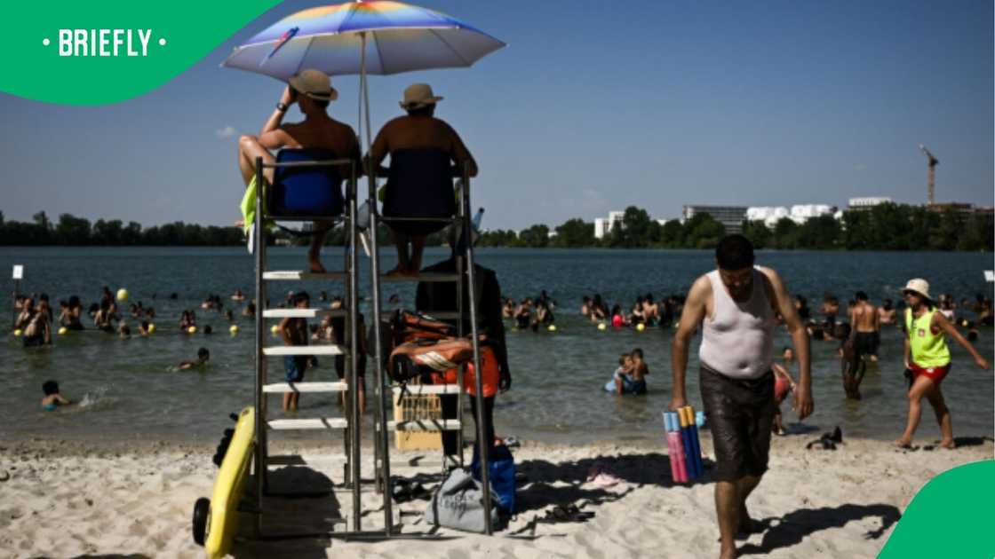 The visual showed multiple people at the beach during a heatwave in Europe The visual showed multiple people at the beach during a heatwave in Europe
