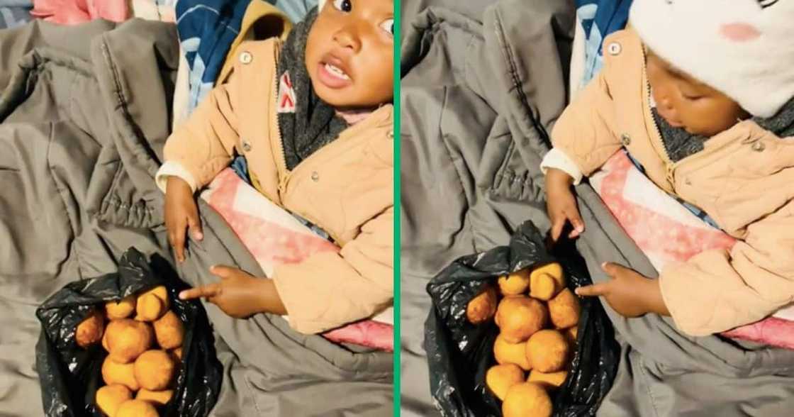 A little girl tried eating magwinya for the first time A little girl tried eating magwinya for the first time