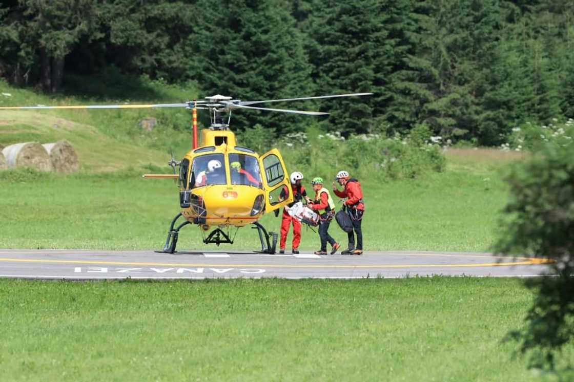 Rescuers resumed the search for survivors Monday, though hopes were 'slim' Rescuers resumed the search for survivors Monday, though hopes were 'slim'