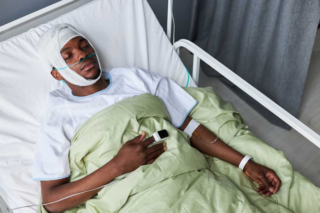 A man in a hospital bed