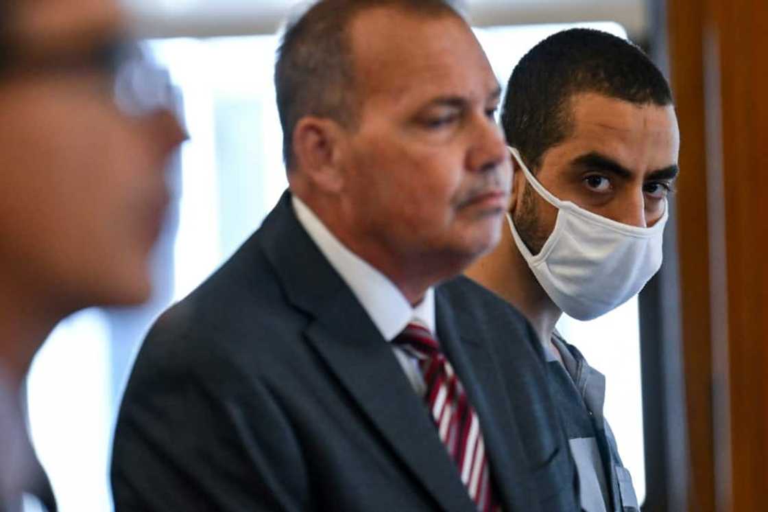 Hadi Matar (R), accused of attempted murder in the attack on author Salman Rushdie, appeared August 18, 2022, at a procedural hearing in the county courthouse in Mayville, New York