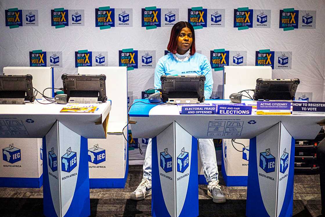 An official sits at a voter registration table at the launch event for the 2026 Municipal elections at Gallagher Estate on May 27, 2026 in Midrand, South Africa An official sits at a voter registration table at the launch event for the 2026 Municipal elections at Gallagher Estate on May 27, 2026 in Midrand, South Africa