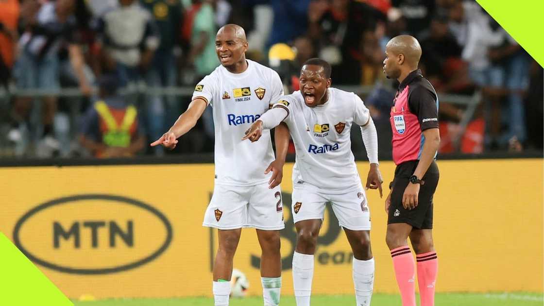 Stellenbosch players complain to Abongile Tom during the MTN8 final against Orlando Pirates at the Moses Mobhida Stadium on Saturday. Photo: @StellenboschFC.