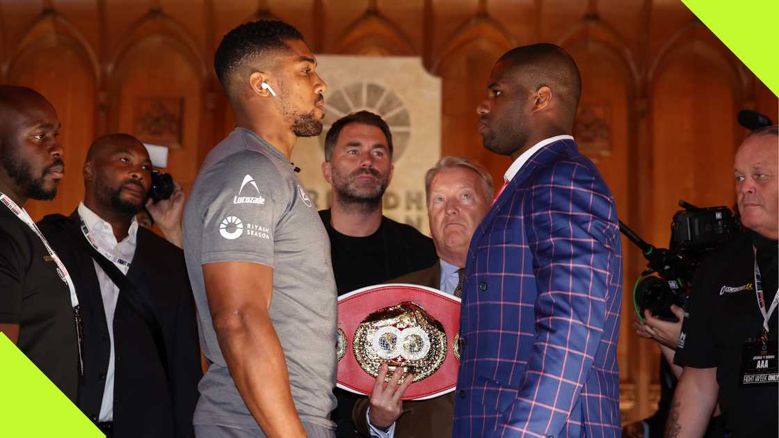 Anthony Joshua and Daniel Dubois face off during their IBF title fight at the Guildhall in London