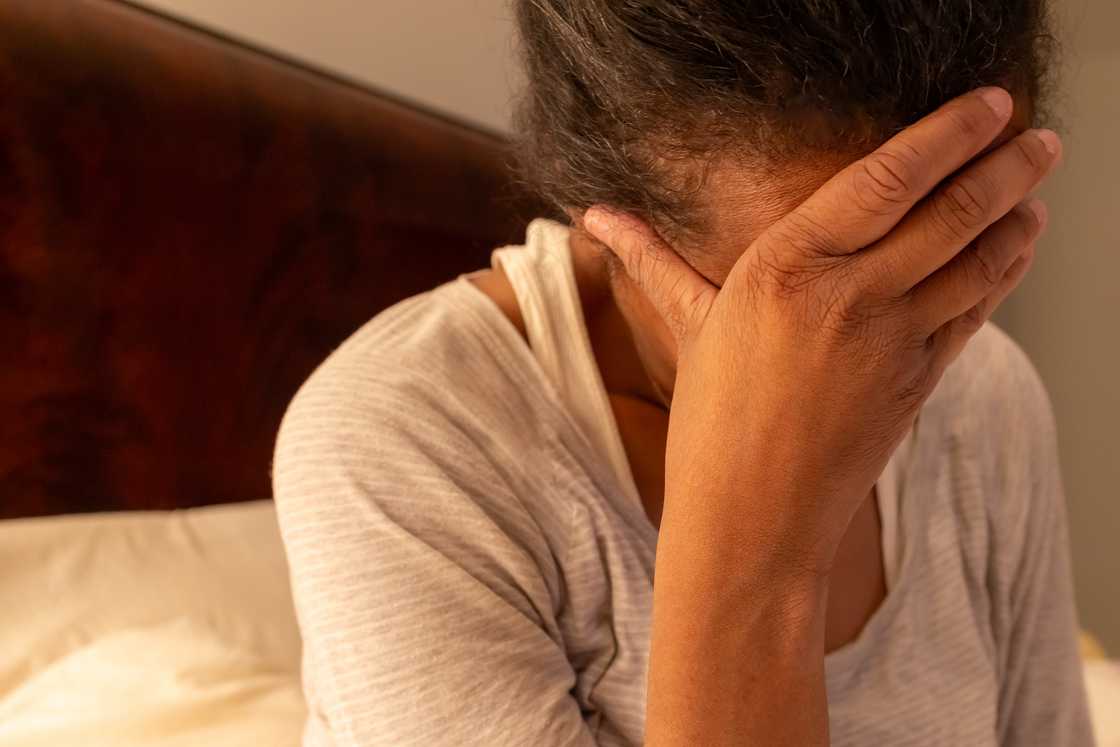 A stressed woman at night