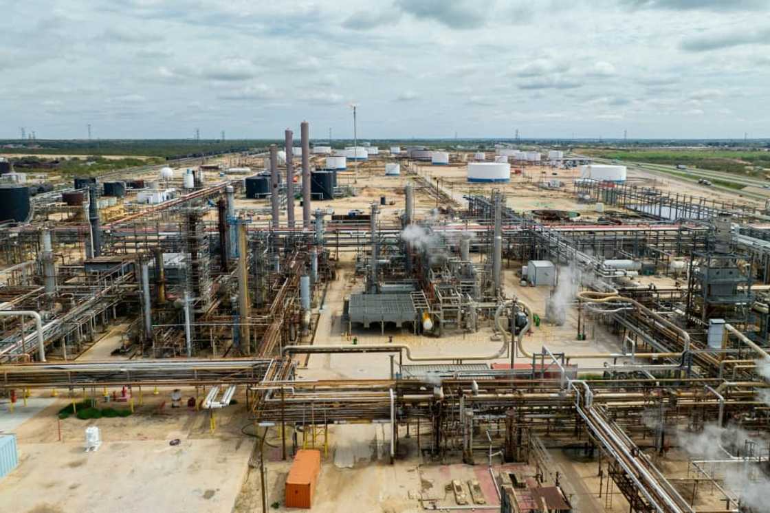 ExxonMobil and Chevron describe recent transactions as a balanced approach, but critics say they are locking the companies into fossil fuels for the long-term ExxonMobil and Chevron describe recent transactions as a balanced approach, but critics say they are locking the companies into fossil fuels for the long-term