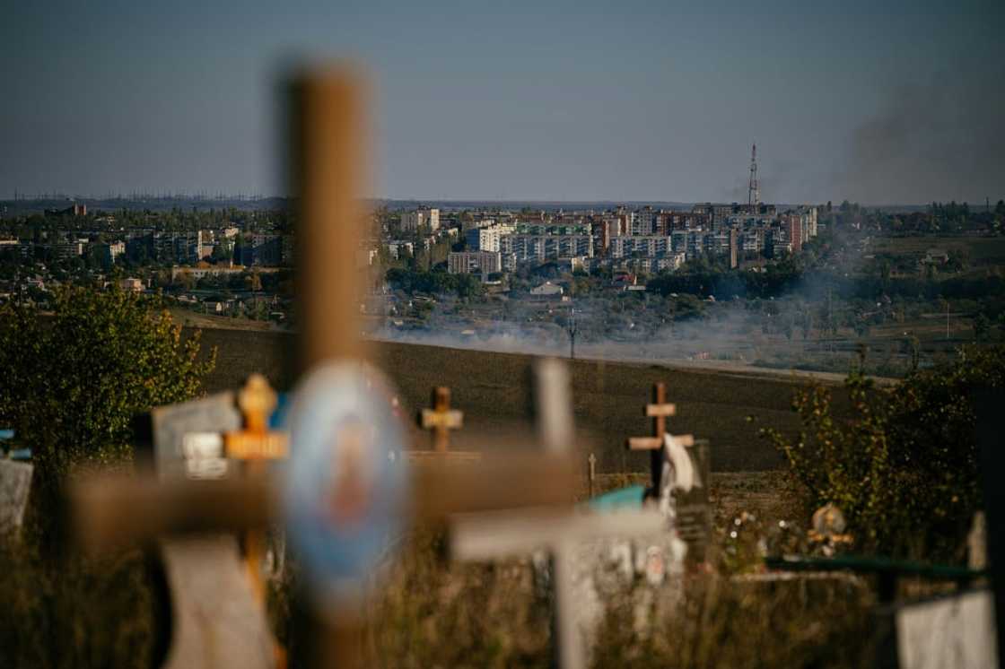 Smoke rises outside Bakhmut, where the conflict has exposed divided loyalties Smoke rises outside Bakhmut, where the conflict has exposed divided loyalties