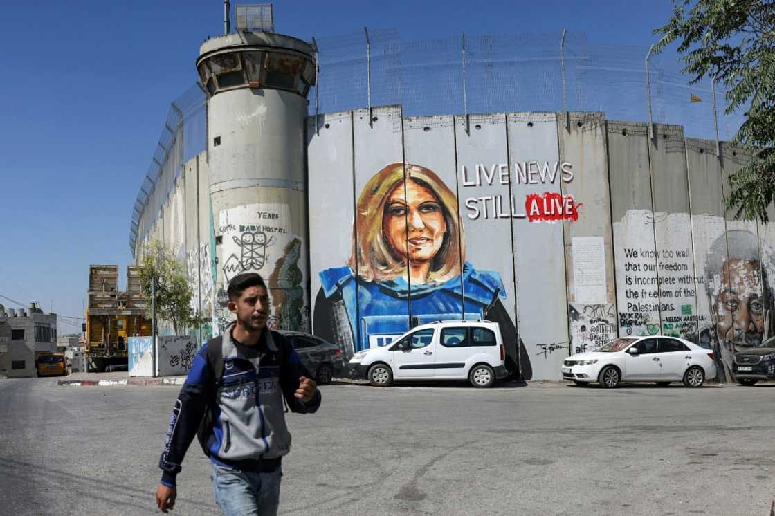 US-Palestinian ties have been strained by the killing of Al Jazeera reporter Shireen Abu Akleh, depicted here in a mural on Israel's controversial barrier US-Palestinian ties have been strained by the killing of Al Jazeera reporter Shireen Abu Akleh, depicted here in a mural on Israel's controversial barrier