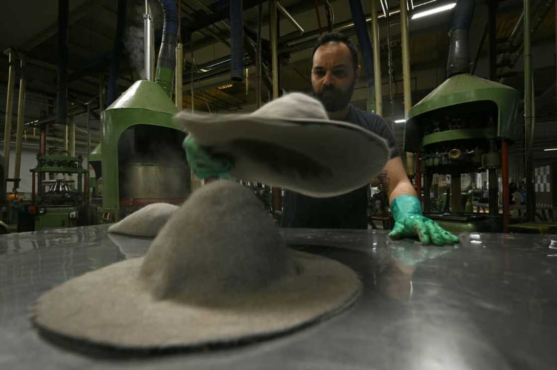 Artisans mould and shape the Fedoras, using quick gestures with surgical precision Artisans mould and shape the Fedoras, using quick gestures with surgical precision