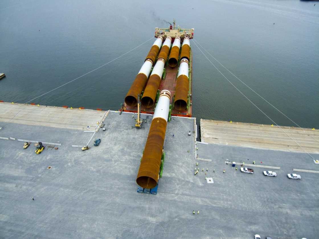 Steel monopile foundations for the Coastal Virginia Offshore Wind commercial project are offloaded at Portsmouth Marine Terminal in Portsmouth, Virginia Steel monopile foundations for the Coastal Virginia Offshore Wind commercial project are offloaded at Portsmouth Marine Terminal in Portsmouth, Virginia