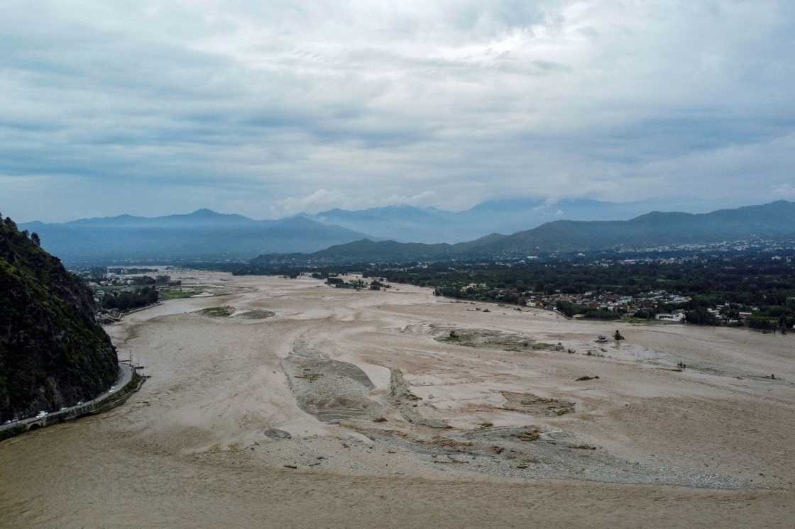 The Swat River became a raging torrent, swallowing up dozens of buildings, including hotels perched on its banks The Swat River became a raging torrent, swallowing up dozens of buildings, including hotels perched on its banks