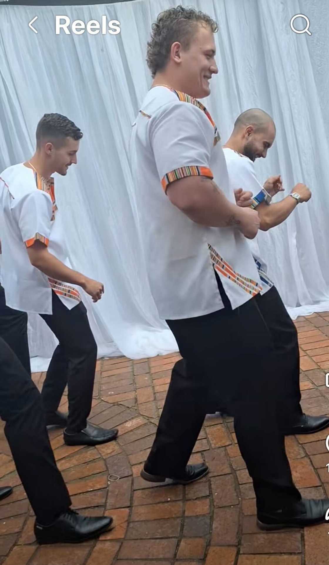 A wedding dance by a group of groomsmen had online users laughing.