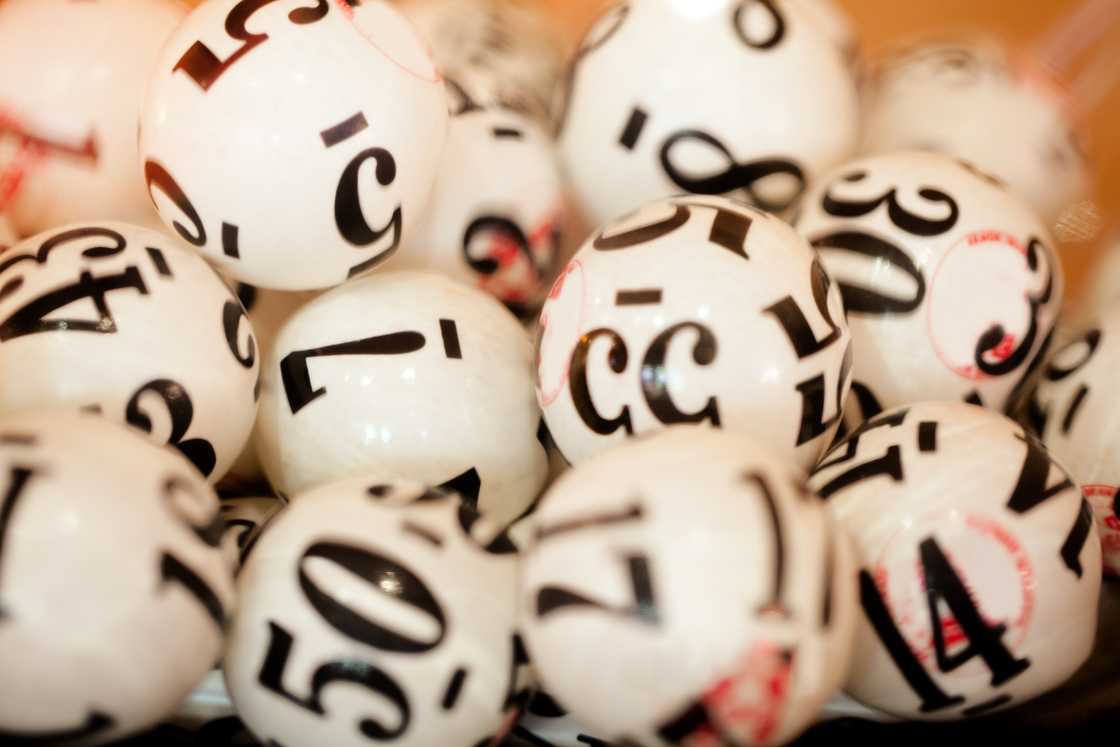 A mixture of white lottery balls. A mixture of white lottery balls.
