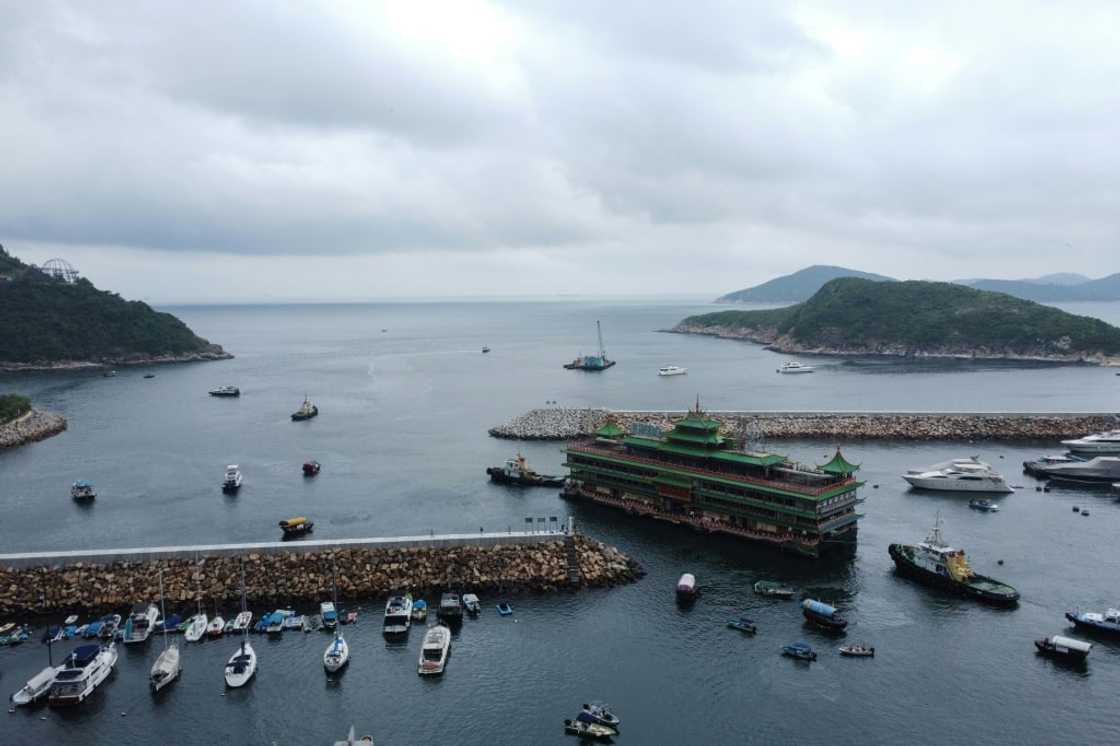 The restaurant was towed away from the southern Hong Kong Island typhoon shelter where it had sat for nearly half a century The restaurant was towed away from the southern Hong Kong Island typhoon shelter where it had sat for nearly half a century