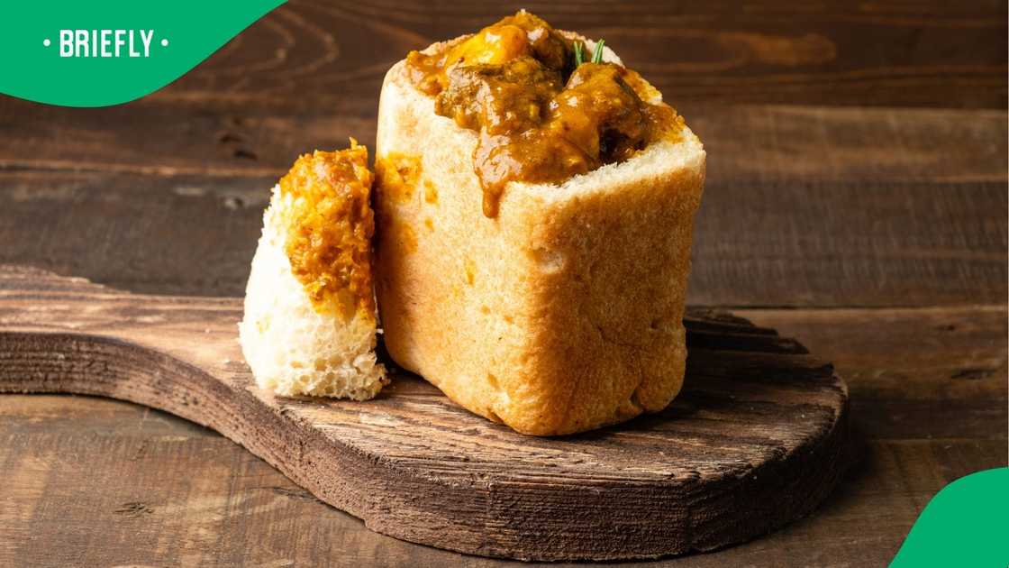South African curry served in white bunny chow bread. South African curry served in white bunny chow bread.