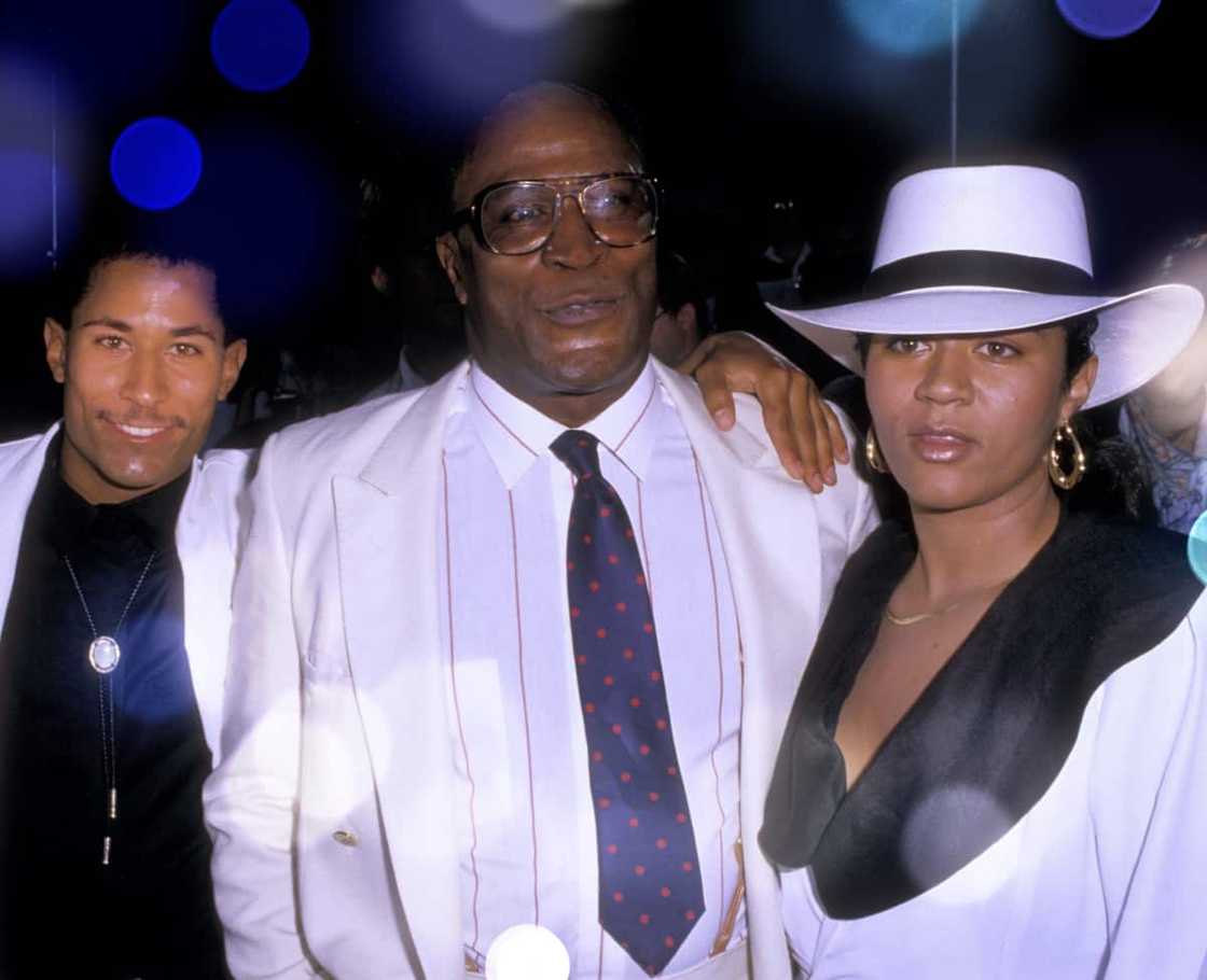 John Amos KC Amos and Noel Amos in 1988 John Amos KC Amos and Noel Amos in 1988