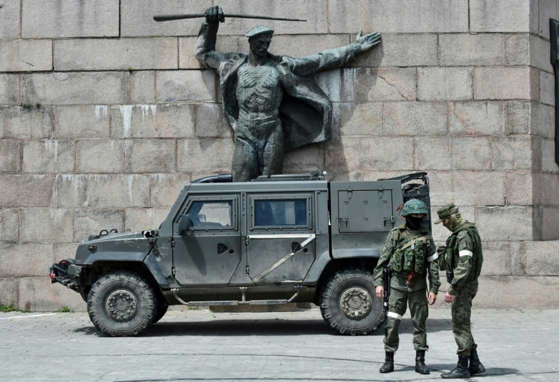 Pro-Kremlin officials have begun pulling out of the southern Ukraine city of Kherson, shown here on May 20, 2022 Pro-Kremlin officials have begun pulling out of the southern Ukraine city of Kherson, shown here on May 20, 2022