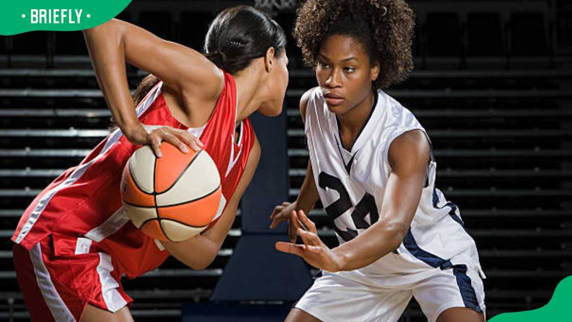 Ladies playing basketball