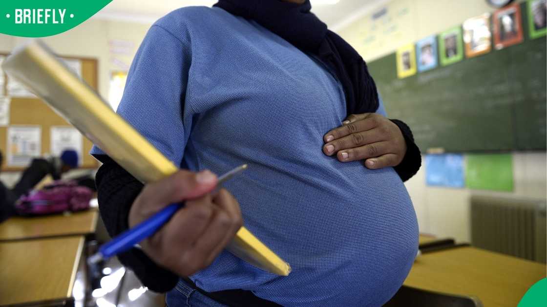 A pregnant student poses on July 29, 2013 in Pretoria at the Pretoria Hospital School specialised in teenage pregnancy.
Image: STEPHANE DE SAKUTIN/AFP A pregnant student poses on July 29, 2013 in Pretoria at the Pretoria Hospital School specialised in teenage pregnancy.
Image: STEPHANE DE SAKUTIN/AFP